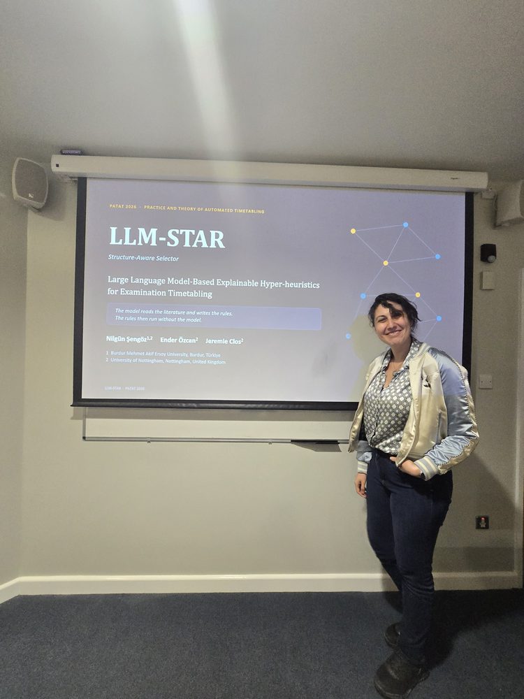 Nilgün Şengöz with the LLM-STAR title slide at PATAT 2026